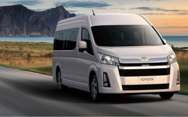 Office team departing for outing in Hiace